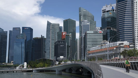 Singapore’s central bank tightens policy in surprise move