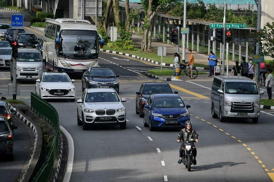 Car COE premiums fall in first tender after quota increase; Open category COE hits record $125,000
