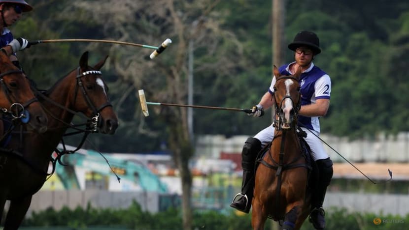 Britain's Prince Harry saddles up for Singapore charity polo game