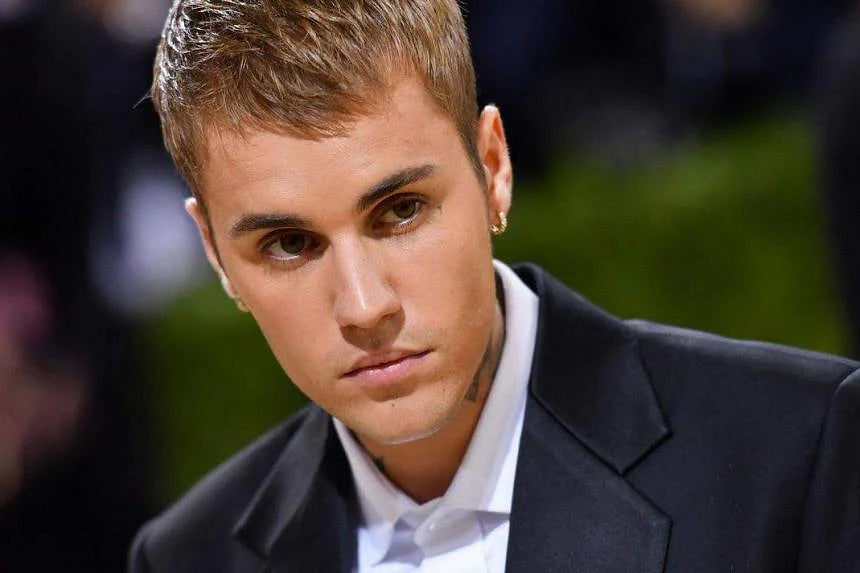 Justin Bieber scraps world tour over health issues, promoters say Singapore show still on track