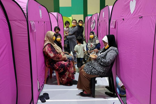 Rising flood waters in Johor force nearly 6,000 people to stay in temporary relief centres