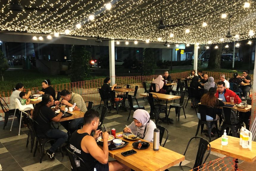 Some diners in Singapore adjust eating-out plans on news of Omicron
