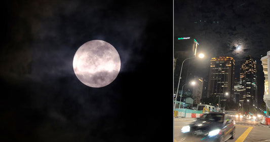 Supermoon shines in S'pore sky through clouds trying to steal its thunder